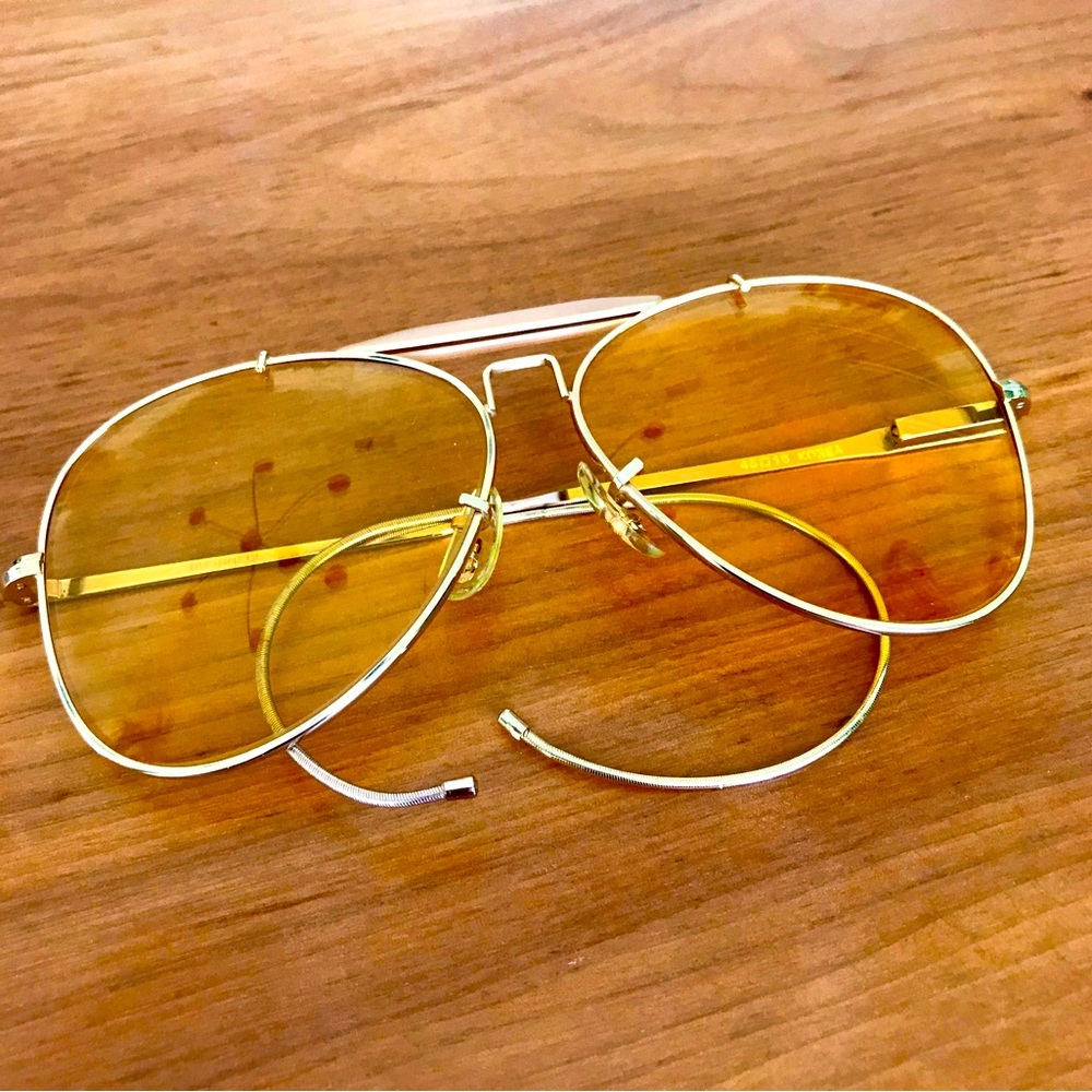 Vintage 1970s Bushnell aviator sunglasses yellow shooting lens 45mm mid size